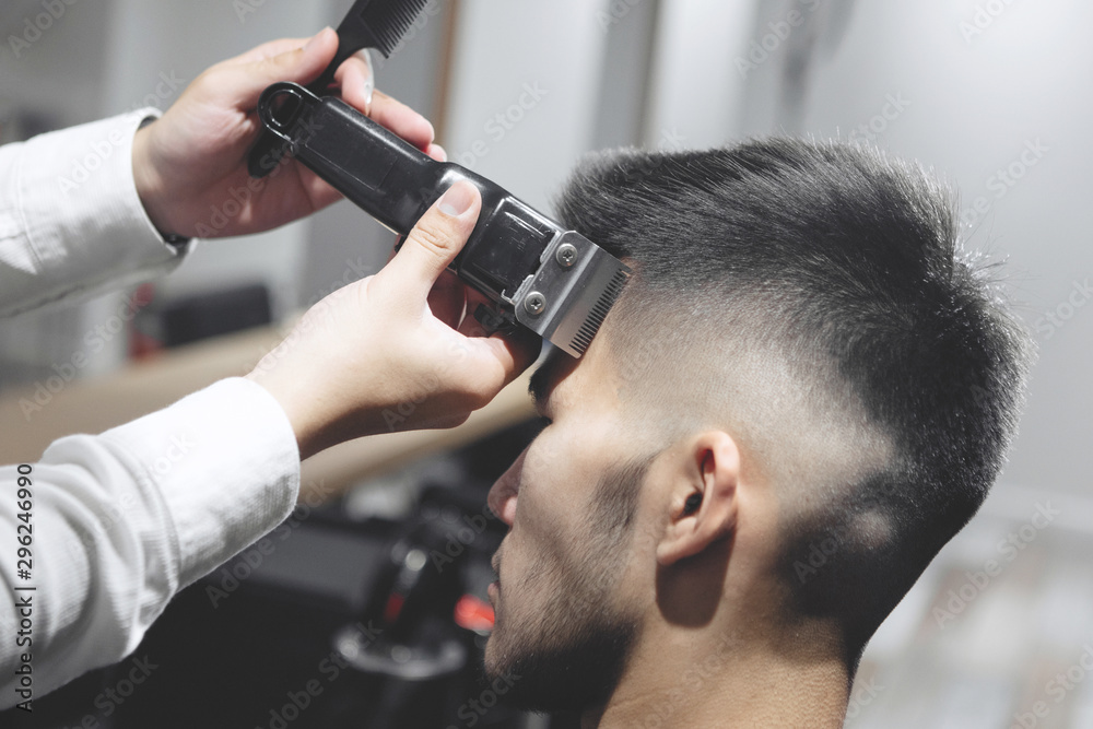 Fototapeta premium Handsome Young Hairdresser.