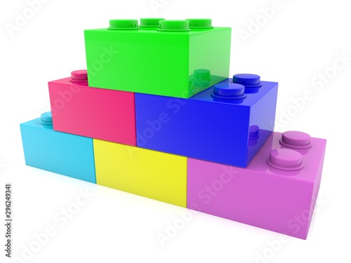 Toy bricks are pyramid, in different colors