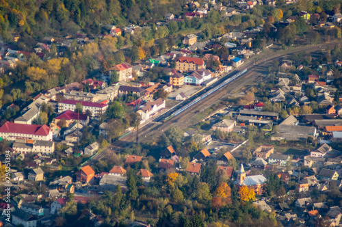A small town among the mountains in autumn, top view