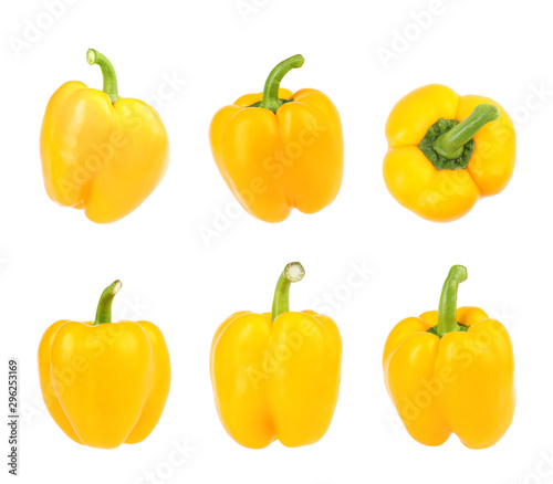 Set of fresh yellow bell peppers on white background