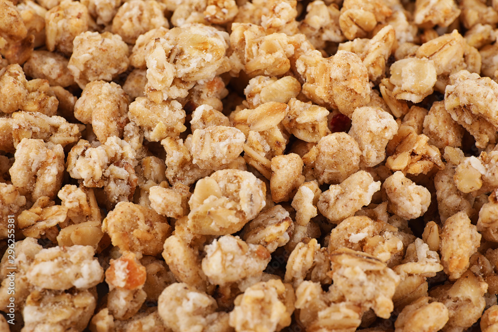 Healthy crunchy granola as background, closeup view Healthy crunchy granola as background, closeup view