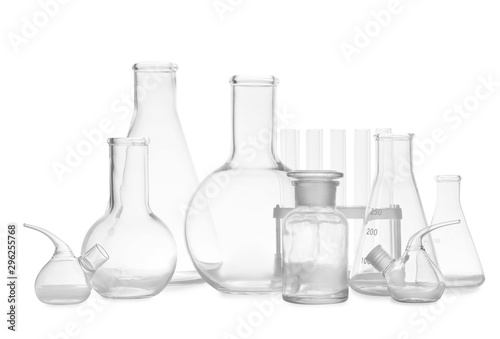 Set of empty laboratory glassware on white background