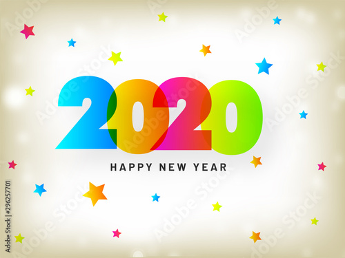 Colorful text 2020 with stars decorated on white bokeh background for Happy New Year celebration.