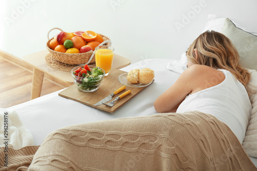 Tray with tasty breakfast o...