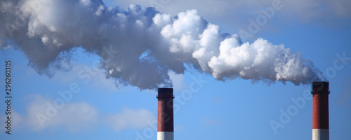Canvas-taulu Smoking chimneys on the winter sky background
