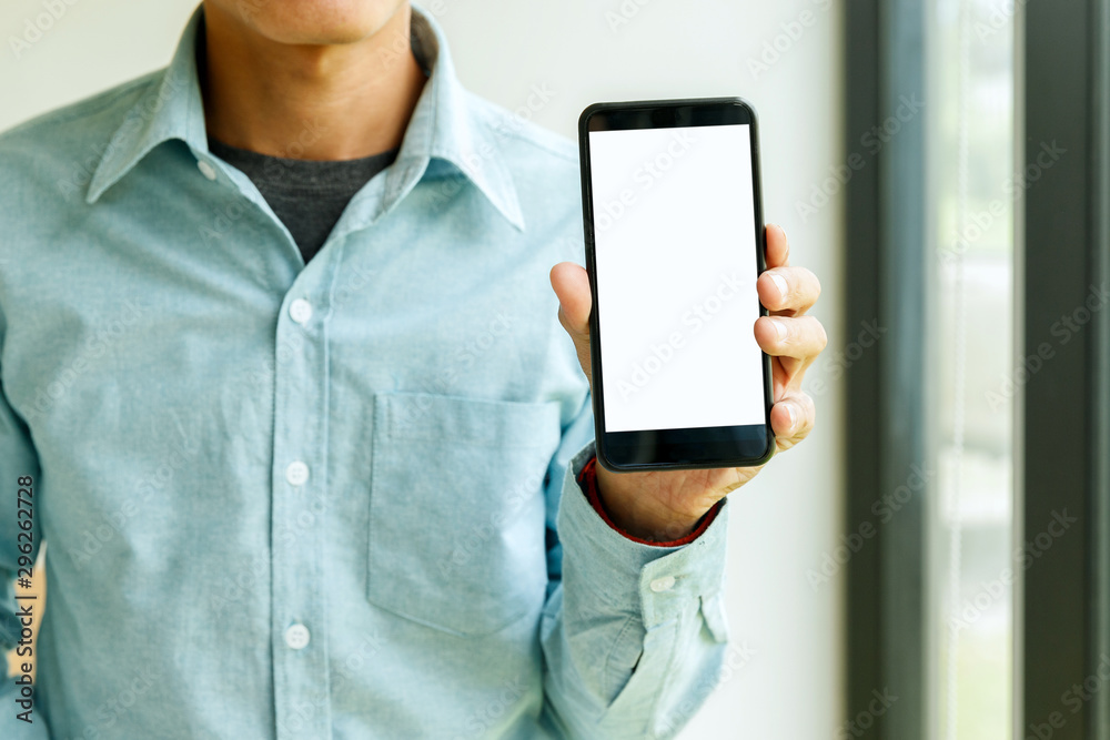 Man holding smartphone in hand. Business man showing smartphone. Man holding smartphone in hand. Business man showing smartphone.