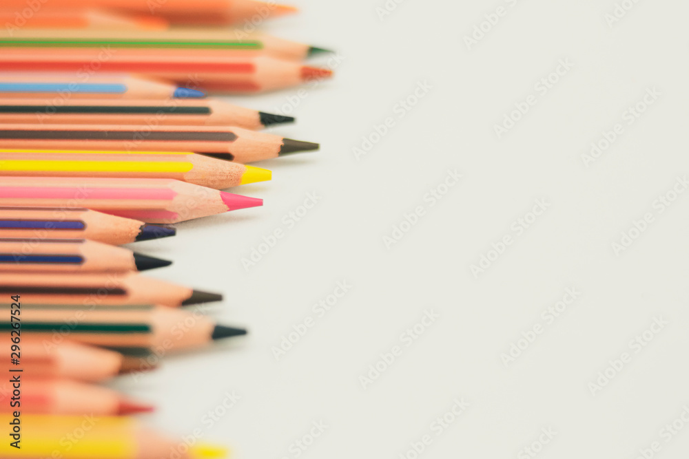 Colored pencils from the left, well sharpened, on white background Colored pencils from the left, well sharpened, on white background