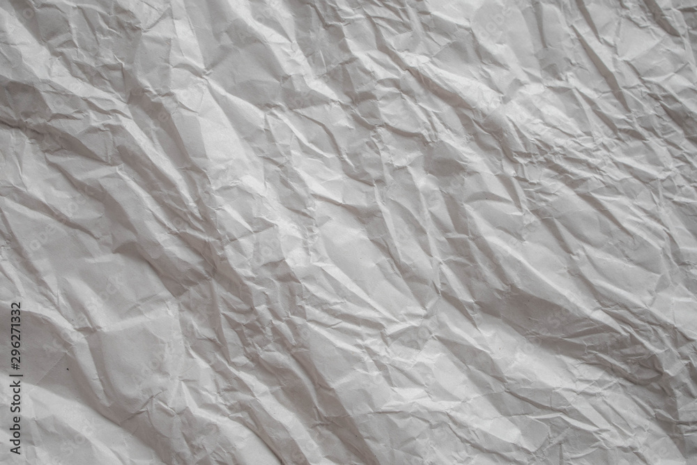 White crumpled paper close up texture background