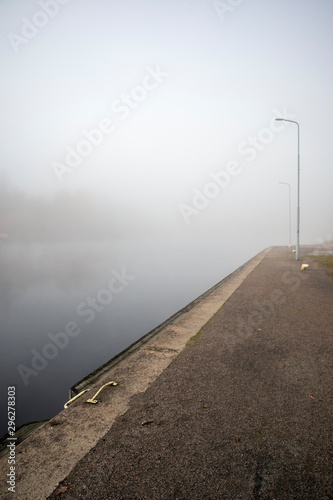 foggy morning at the Saimaa canal in Mustola, Lappeenranta Finland photo