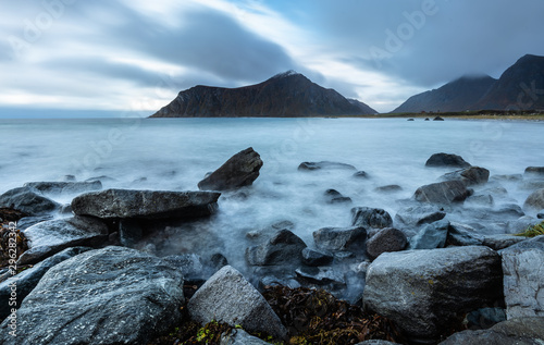 Scenic view of beach with mountain against sky in Lofoten island Norway