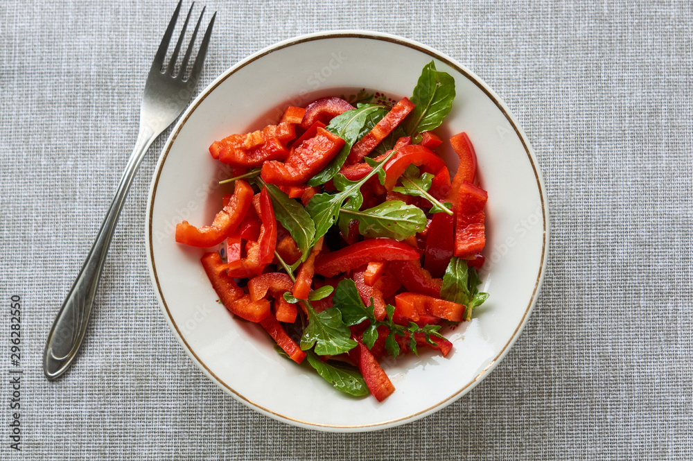 Vegetable salad with red bell pepper and arugula Vegetable salad with red bell pepper and arugula