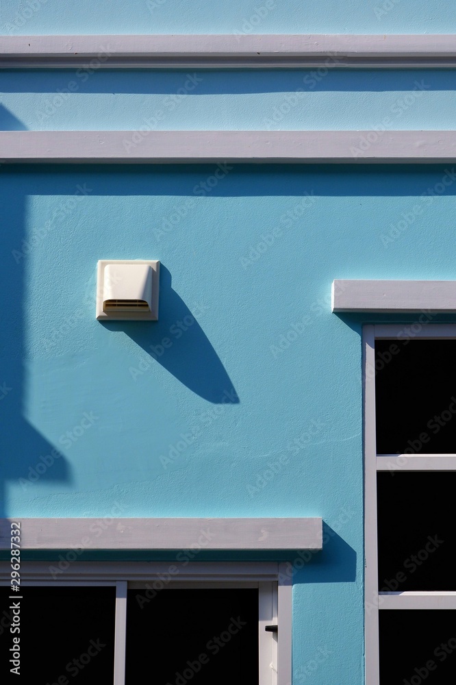 White dryer vent with rectangle and line pattern of window frames with