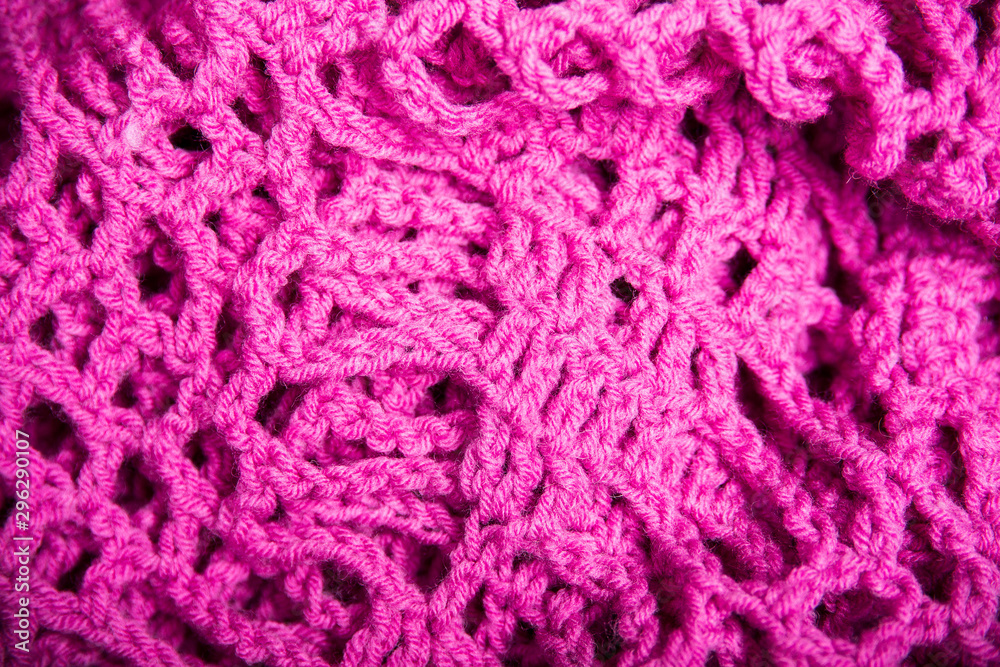 Pink texture knitting. Large knitting. Plaid merino wool. Top view