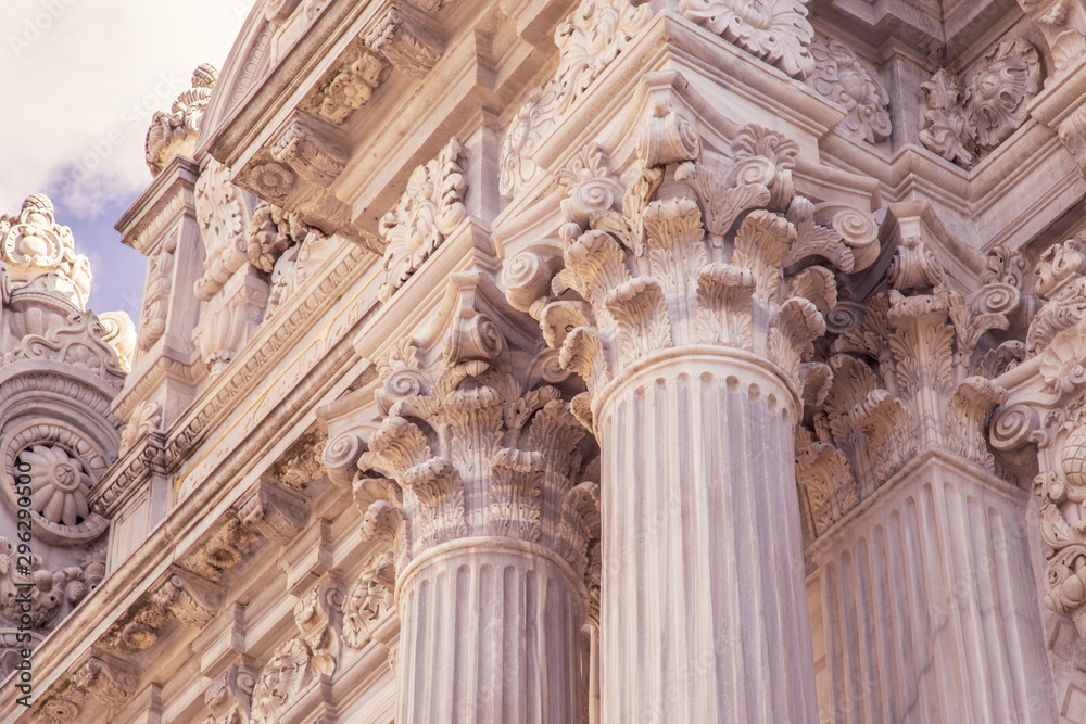 Vintage Old Justice Courthouse Column. Neoclassical colonnade with corinthian columns as part of a public building resembling a Greek or Roman temple