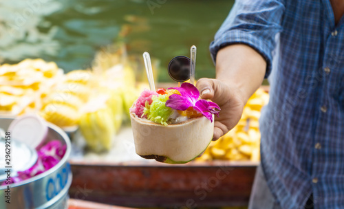 Coconut  ice cream in floating market ratchadamnoen Thailand