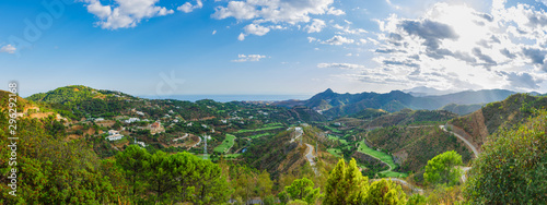 Mountain landscape on a sunny day. Panoramic view from the serpentines of the highway A-397 Ronda - Malaga. Spain, Andalusia