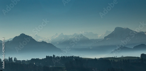 Morning fog above the Luzern lake with mountains © vojta