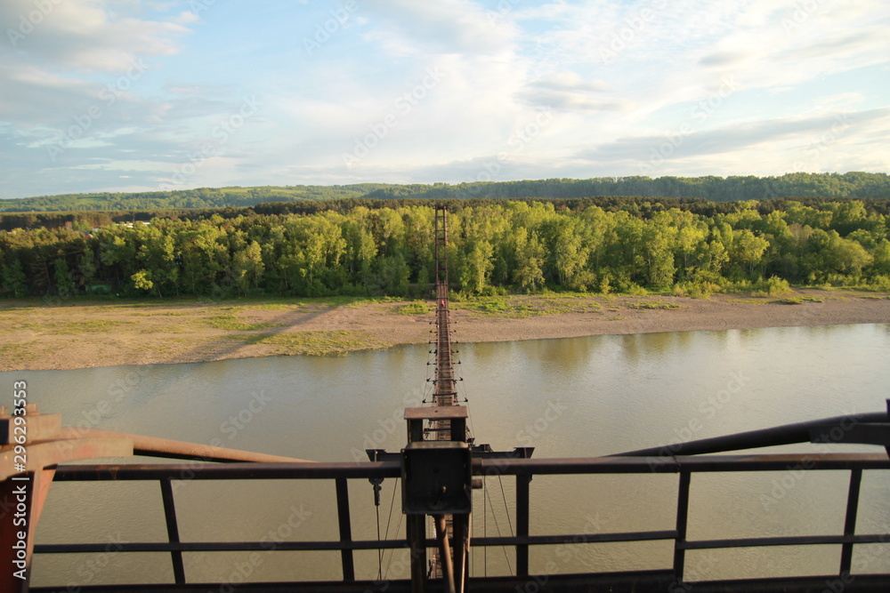 Naklejka premium bridge. suspension bridge. bridge in the village, summer