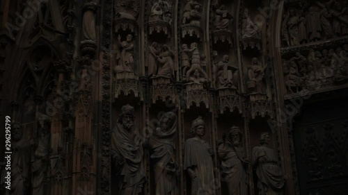 Strasbourg Notre-Dame cathedral, Alsace, France. Closeup of Saints sculpture on the exterior of church building. Old town gothic architecture, catholic religion, travel landmark.