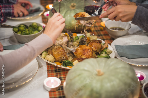 Hands withÂ forks taking meat