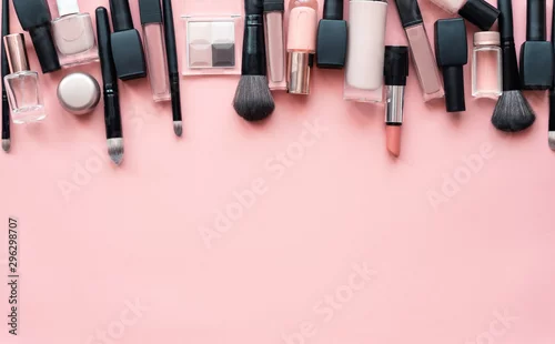 Obraz Beauty make up cosmetic women products accessories in line row on pink flat lay background, cheap discount commercial retail sale offer online purchase, top view above copy space, makeup wide banner