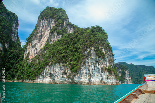 mountains lake river sky and natural attractions in Ratchaprapha Dam at Khao Sok National Park, Surat Thani Province, Thailand.