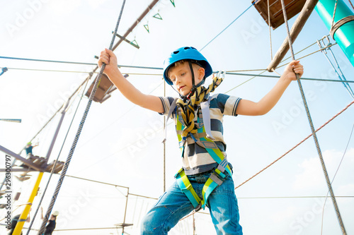 Boy in a sports park amusement extreme park.