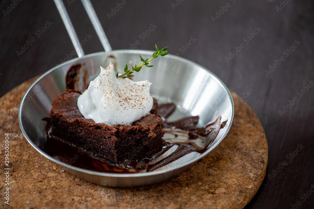 Brownie with cheesecake on top whip cream Brownie with cheesecake on top whip cream