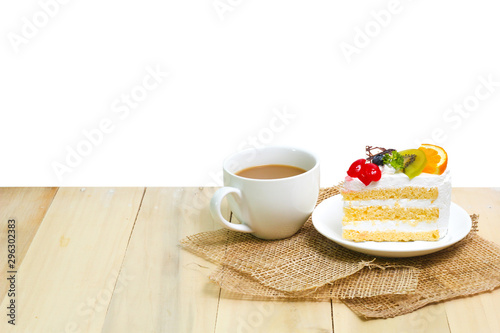 Slice cake with coffee cup on wood   white background