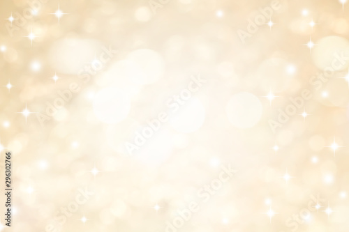 abstract blur soft gradient gold color background with star glittering light for show,promote and advertisee product and content in merry christmas and happy new year season collection concept  © chinnarach