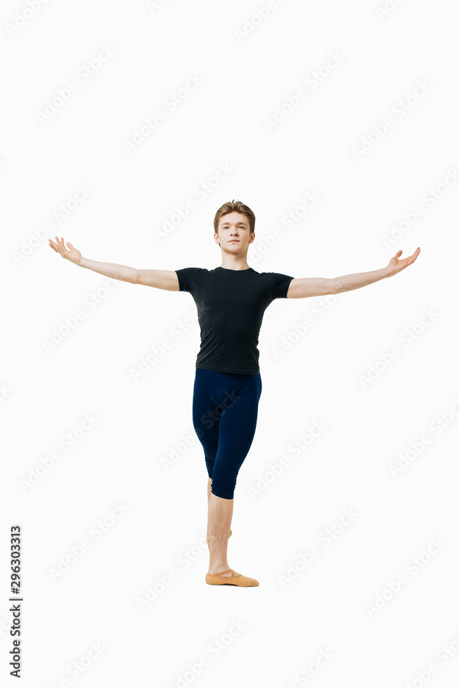 Actor Russian ballet,young ballet dancer performing complex elements on a white background Actor Russian ballet,young ballet dancer performing complex elements on a white background