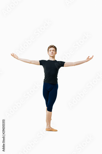 Actor Russian ballet,young ballet dancer performing complex elements on a white background