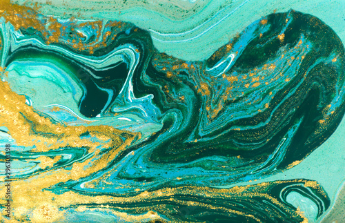 Blue, green and gold glitter pattern. Golden powder liquid texture.