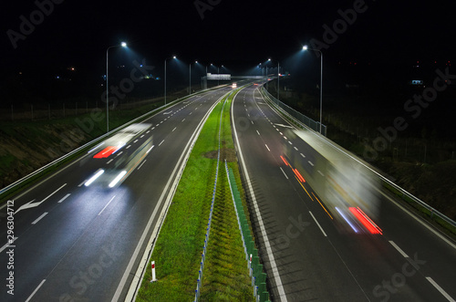 ON THE ROAD AT NIGHT - Vehicles on a modern expressway