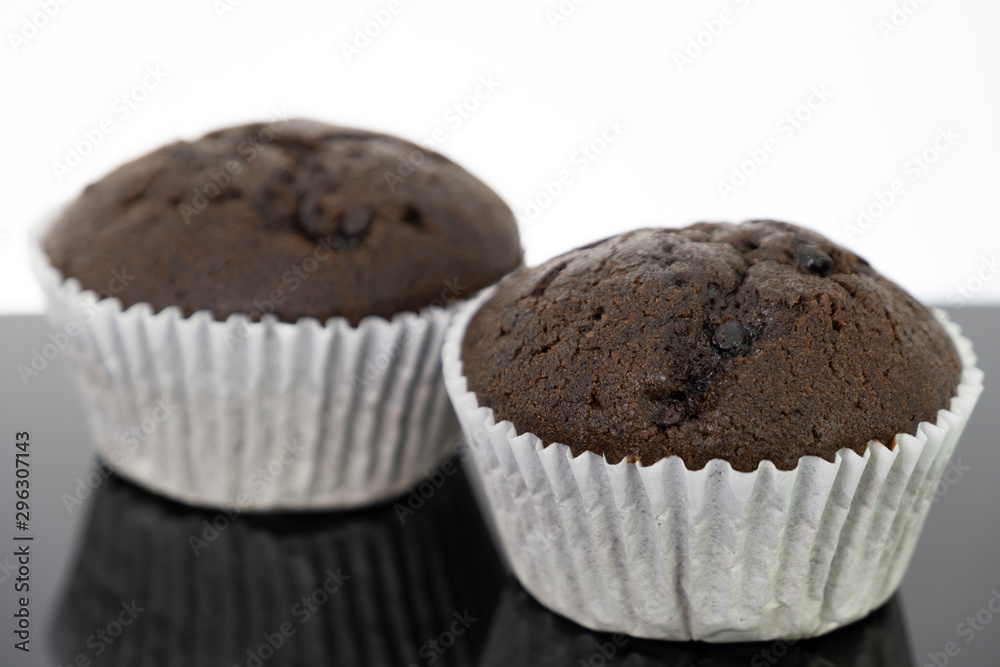 Delicious of chocolate chip cupcake isolated on black background Delicious of chocolate chip cupcake isolated on black background