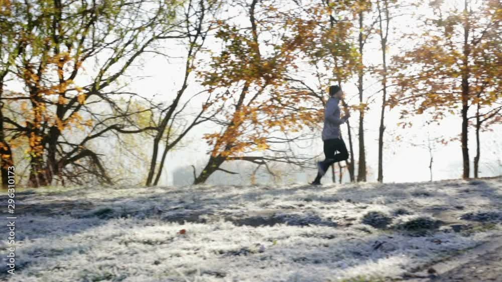 Young man running during autumn morning Young man running during autumn morning