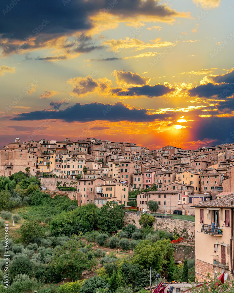 Sunset Over Colorful Old Buildings in Siena Italy
