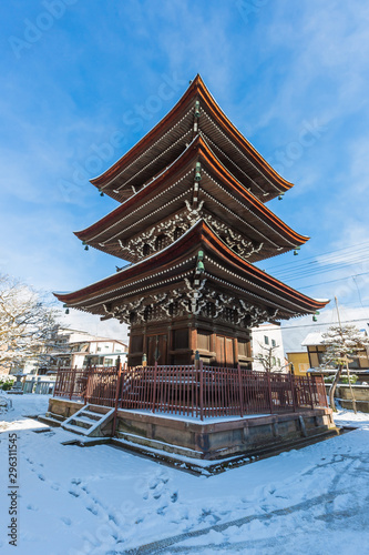 Hida Kokubunji Temple takayama with snow under blue sky