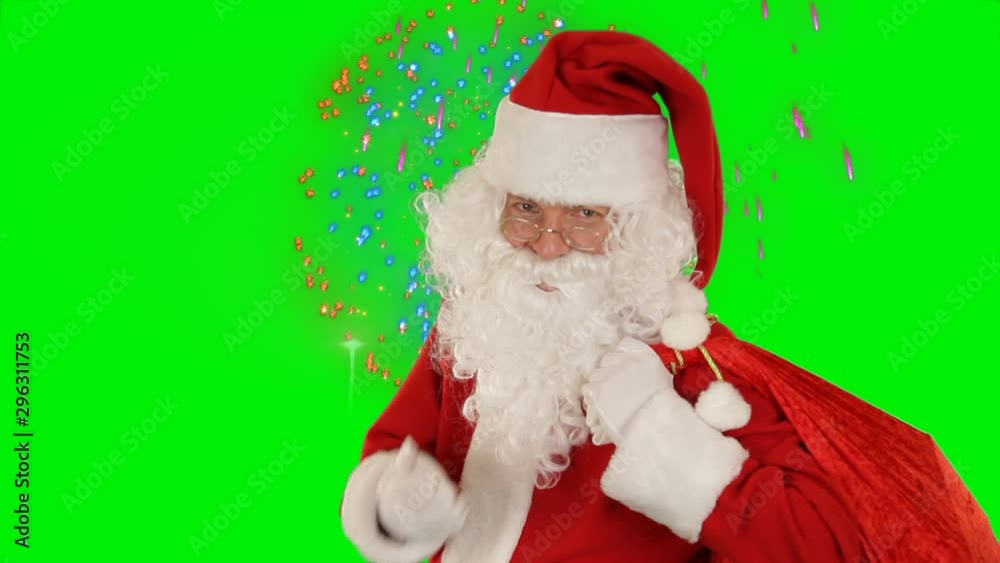 Santa Claus sends a kis and wave, against holiday fireworks, Green Screen Chromakey Santa Claus sends a kis and wave, against holiday fireworks, Green Screen Chromakey