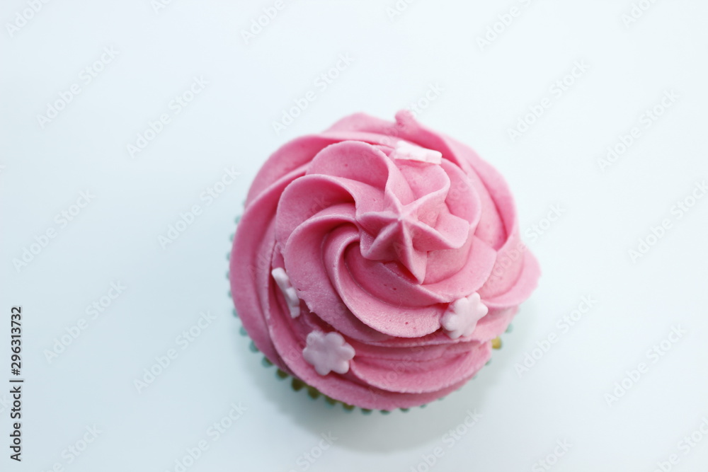 top view of pink cupcake isolated on white background 