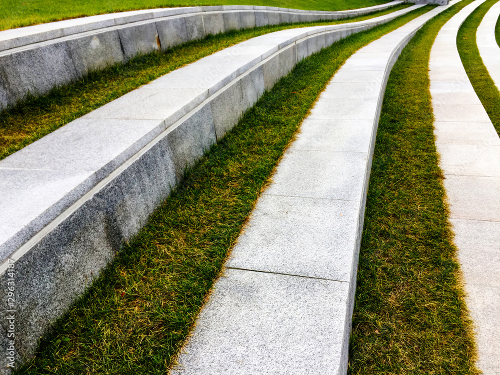 Obraz premium Block lane on lawn green grass in september