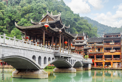 View of scenic bridge on wooded mountains background, Fenghuang