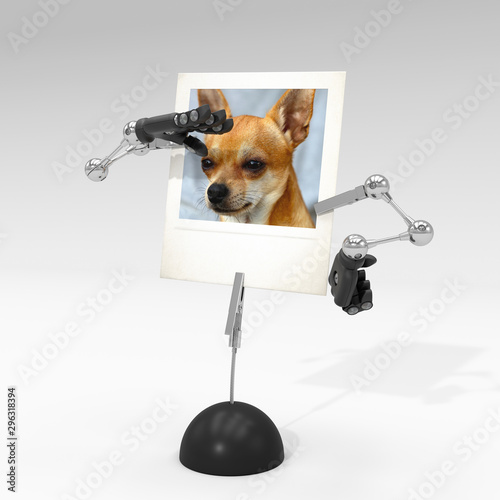 photo of a dog on picture clip holder with toy arms looking from afar