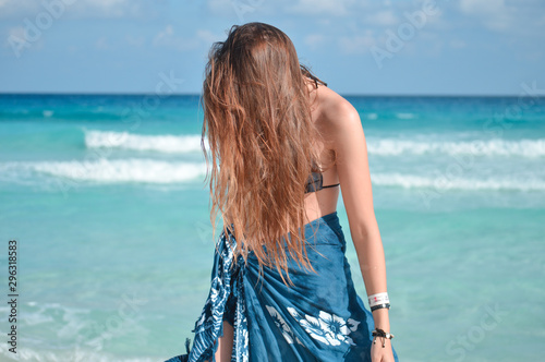Young woman enjoying the beach