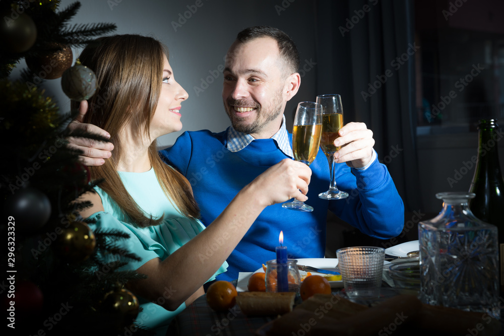 Happy couple celebrating Christmas