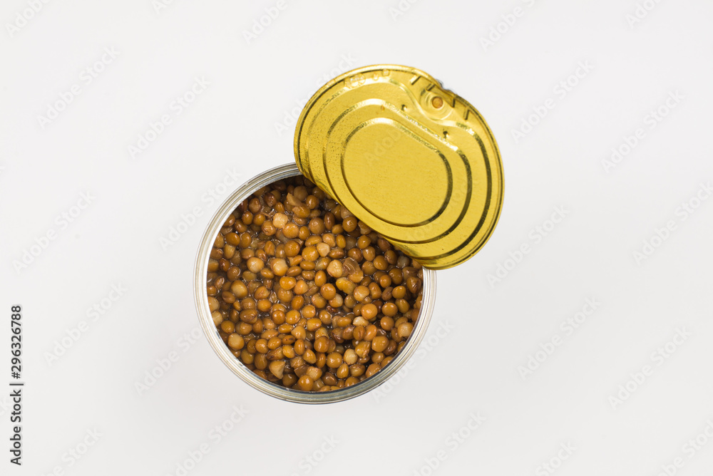 Canned food on white background. Lentils.