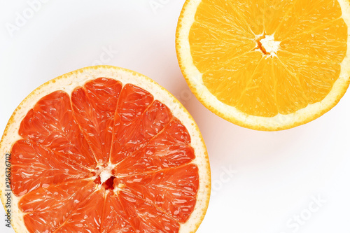 Orange grapefruit slice closeup on white background