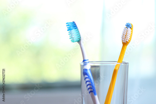 Toothbrushes and oral cleaners on the table.
