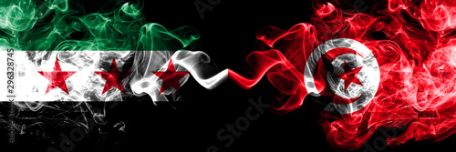 Syrian Arab Republic vs Tunisia, Tunisian smoke flags placed side by side. Thick colored silky smoke flags of Syria opposition and Tunisia, Tunisian photo