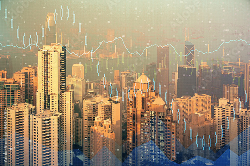 Forex chart on cityscape with skyscrapers wallpaper double exposure. Financial research concept.